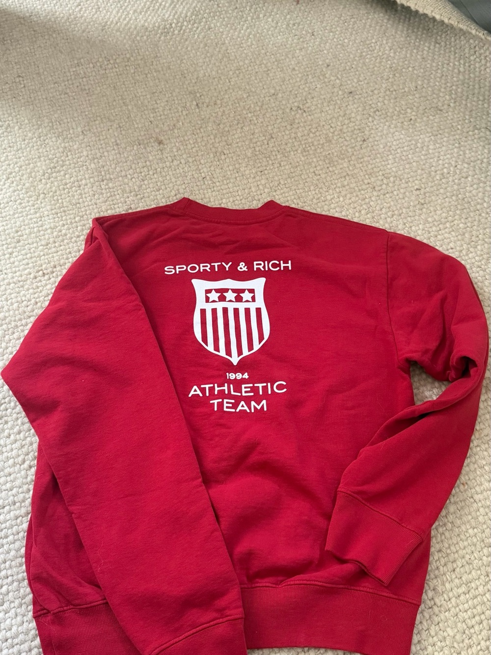 Sporty & Rich Red Crewneck with White Athletic Shield